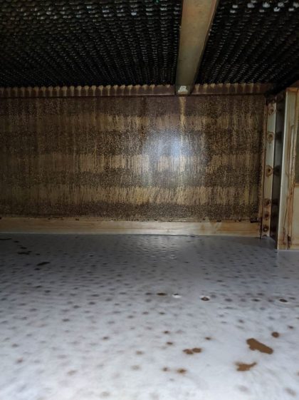 A room with a floor that has been cleaned.